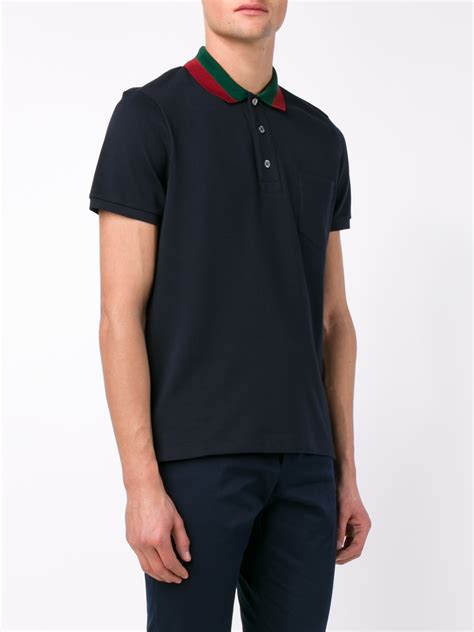 gucci navy striped polo shirt.